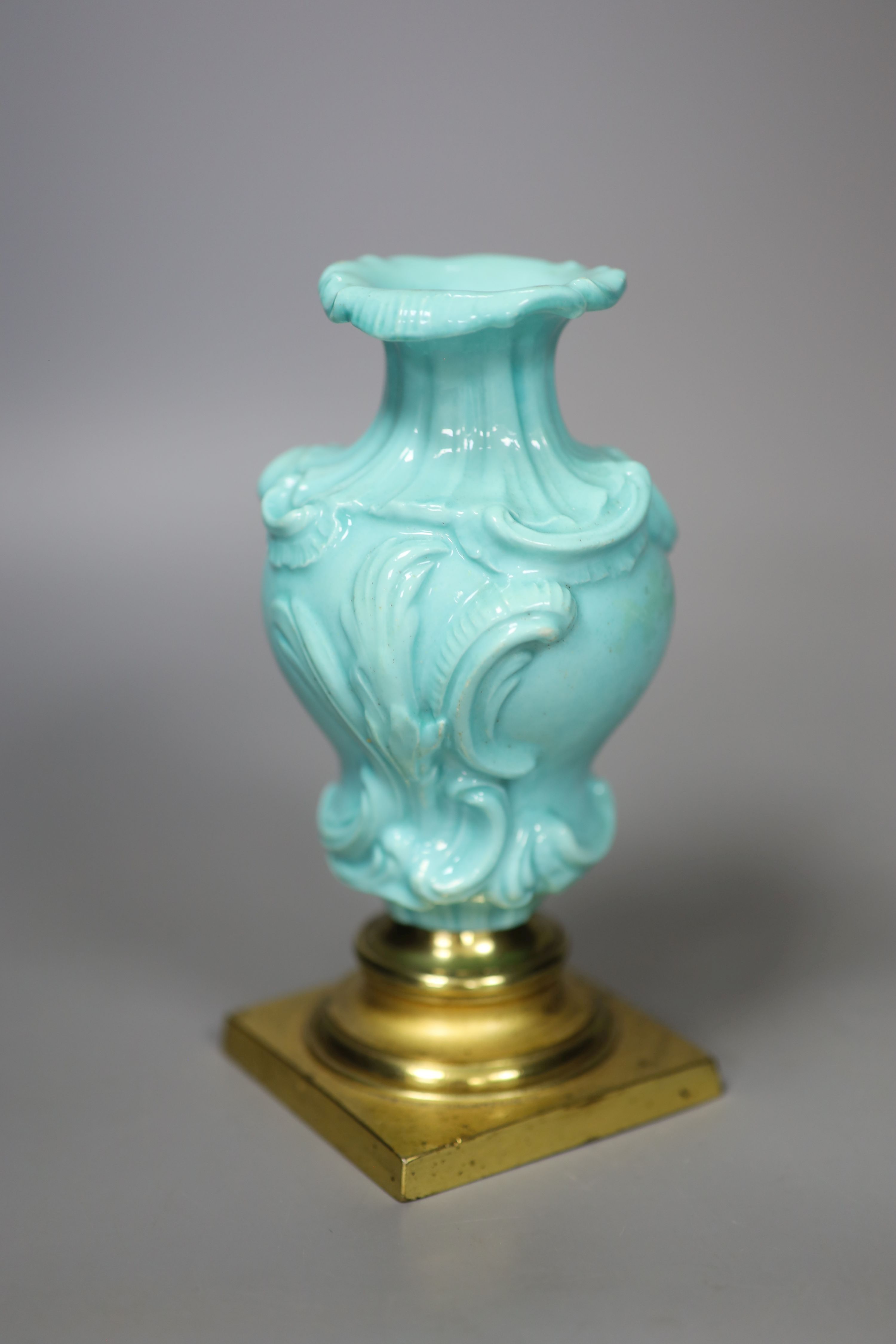 A Chelsea Derby rare rococo moulded vase with celadon type ground, mount on a gilt metal base, from the collection of Dr. Alasdair Morr